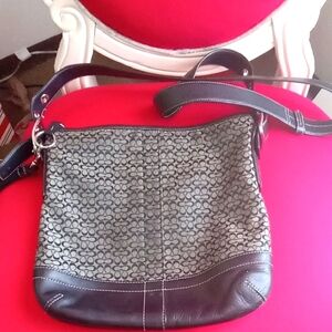 Black and Gray coach purse.